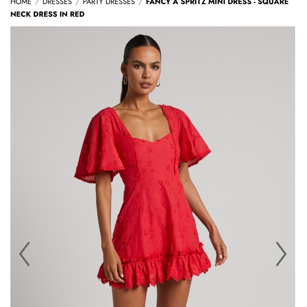 Never been worn. Cute summer cocktail dress. Size 2. From Showwpo.